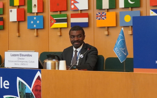 Lazare Eloundou Assomo partecipa alla 31a Assemblea Generale dell'ICCROM nel 2019.