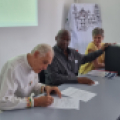 Gael de Guichen and Director General Webber Ndoro sign agreement officially transferring de Guichen's archive of RE-ORG materials to the ICCROM Archives